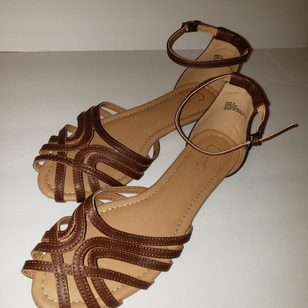 Womens brown flat sandals.